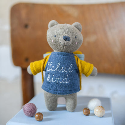 Bär "Schulkind" gelb/blau, mit Schultasche